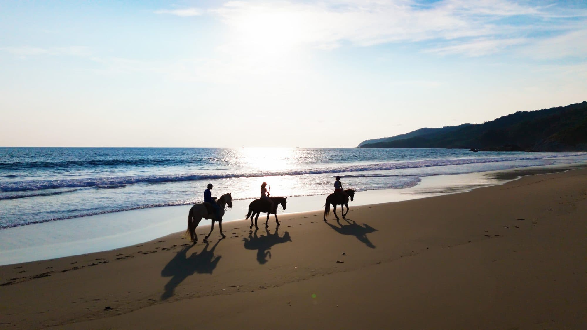 Horseback riding on the beach